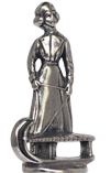 Statuette - lady on sled figurine