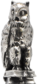 Statuette - hibou sour les libres